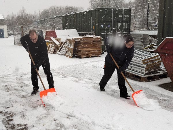 Alan and Rosie shovelling snow